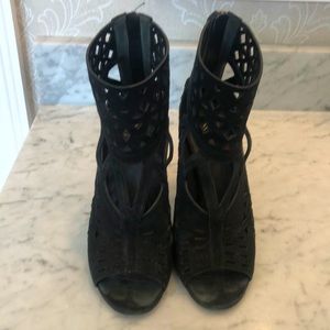 B Brian Atwood cut out ankle boots.